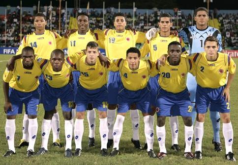 Colombia-09-10-lotto-uniform-yellow-blue-white-group.JPG