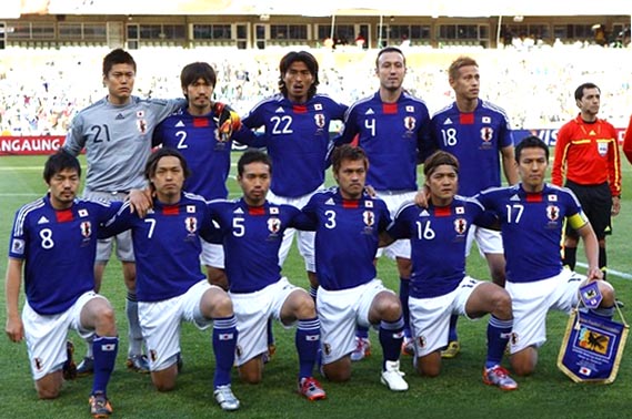 Japan-10-adidas-World Cup-home-kit-blue-white-blue-pose.JPG